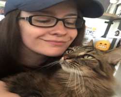 She is a cat-lover and loves to cuddle them. She named her cat Simba.